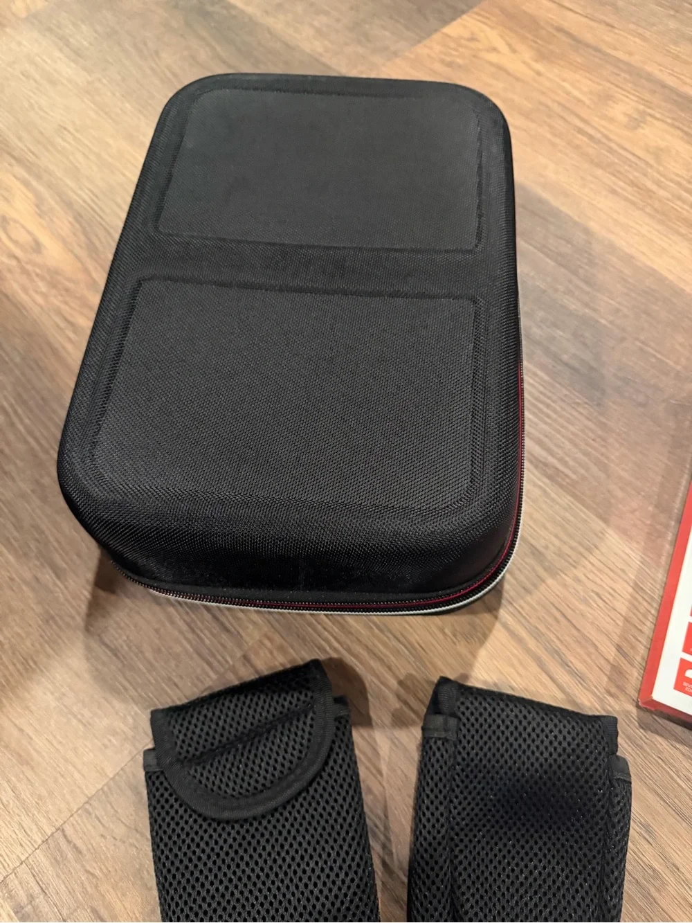 Nintendo Switch Black Carrying Case with Red Accents & accessories